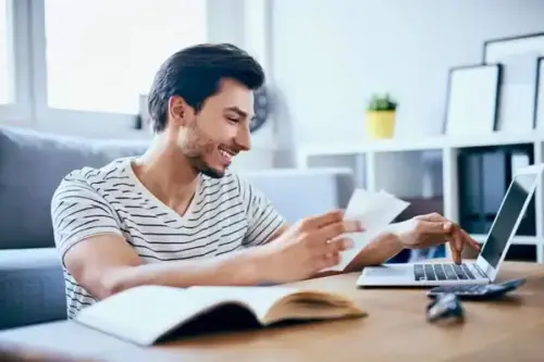 Requirements-page-Guy-looking-at-laptop